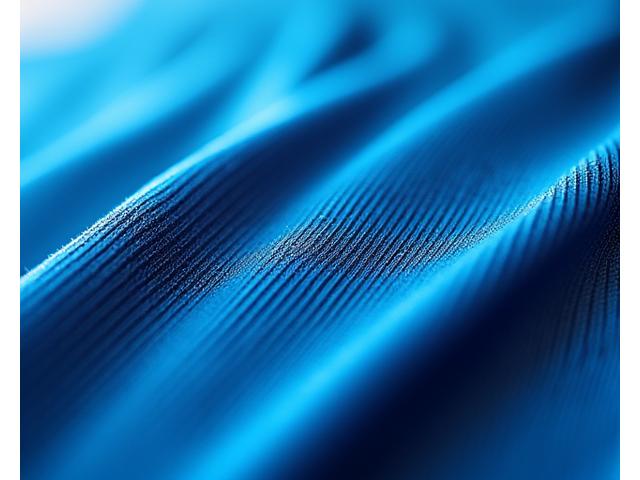 Close-up high-resolution macro shot of advanced activewear fabric with visible moisture-wicking texture.